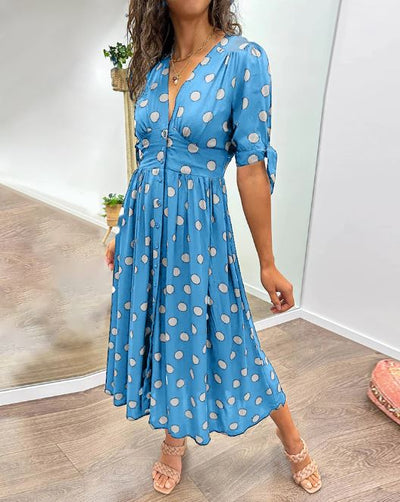 Vestido de lunares con escote en V profundo