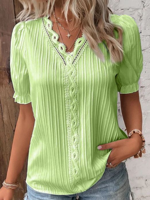 Camisa elegante de cuello en V con bordes lisos