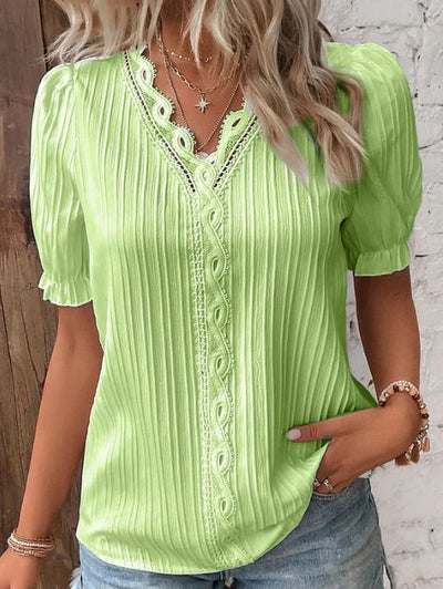 Camisa elegante de cuello en V con bordes lisos