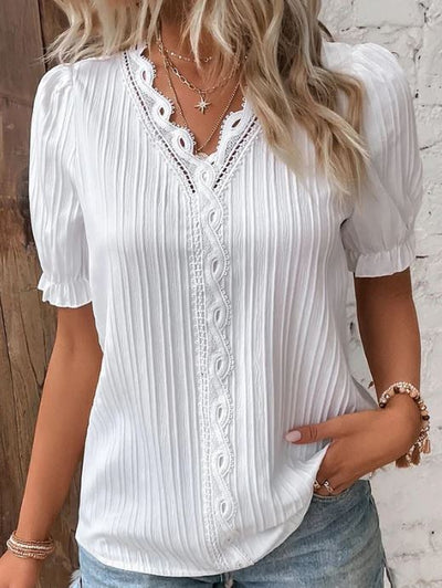Camisa elegante de cuello en V con bordes lisos
