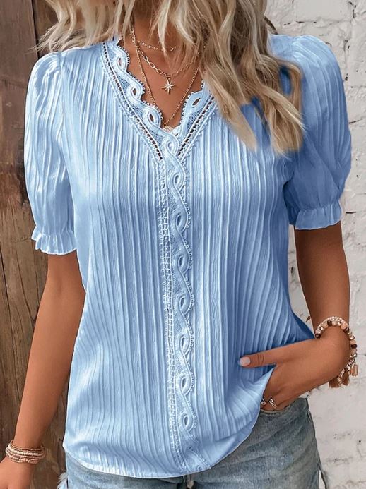 Camisa elegante de cuello en V con bordes lisos
