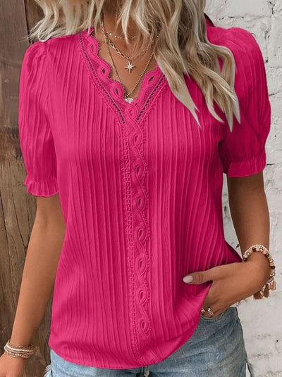 Camisa elegante de cuello en V con bordes lisos
