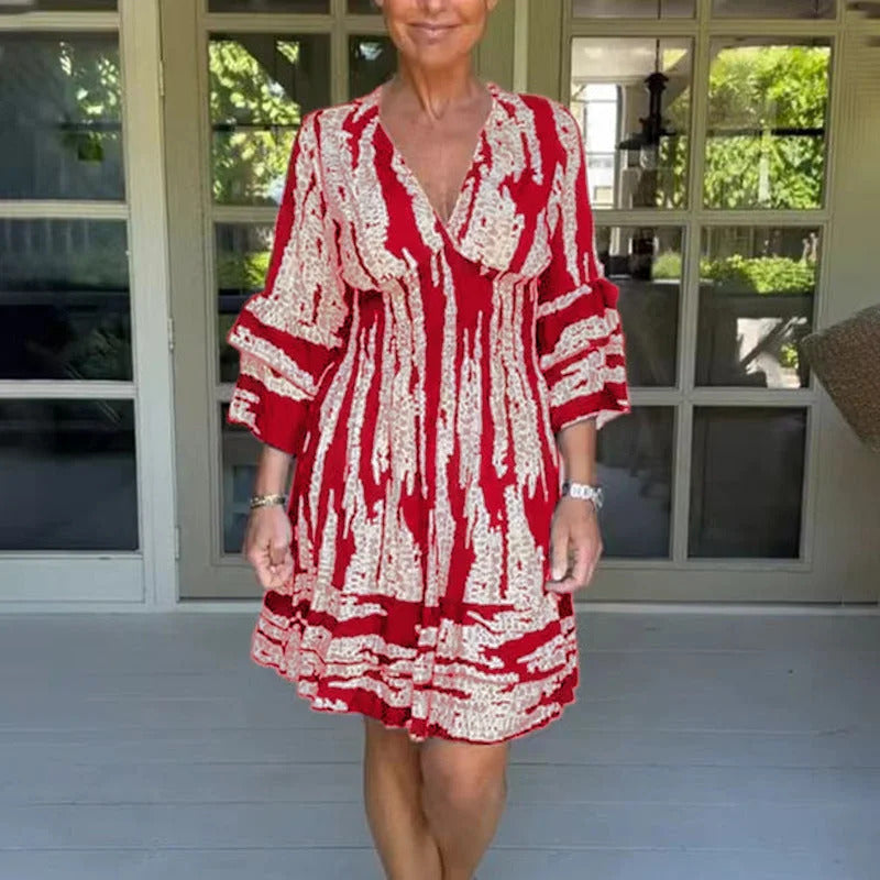 Vestido con escote en V y mangas tres cuartos