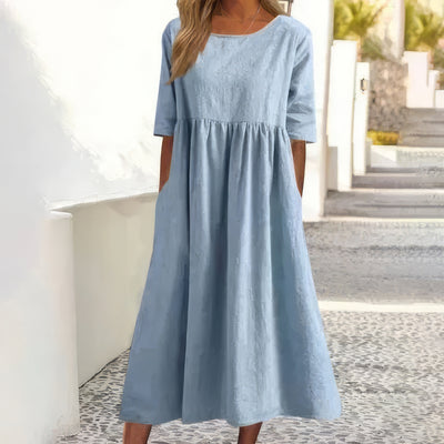 Vestido de algodón con cuello redondo y bolsillos