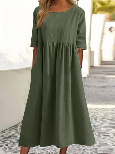 Vestido de algodón con cuello redondo y bolsillos